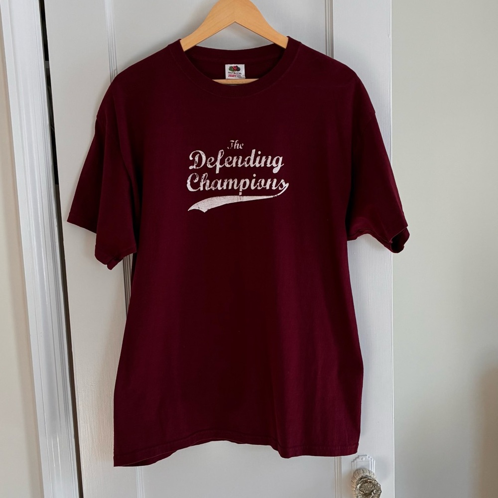 The Defending Champions “Legend” Maroon Band Tee